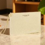 COACH EVENING GOLD POUCH W GWP